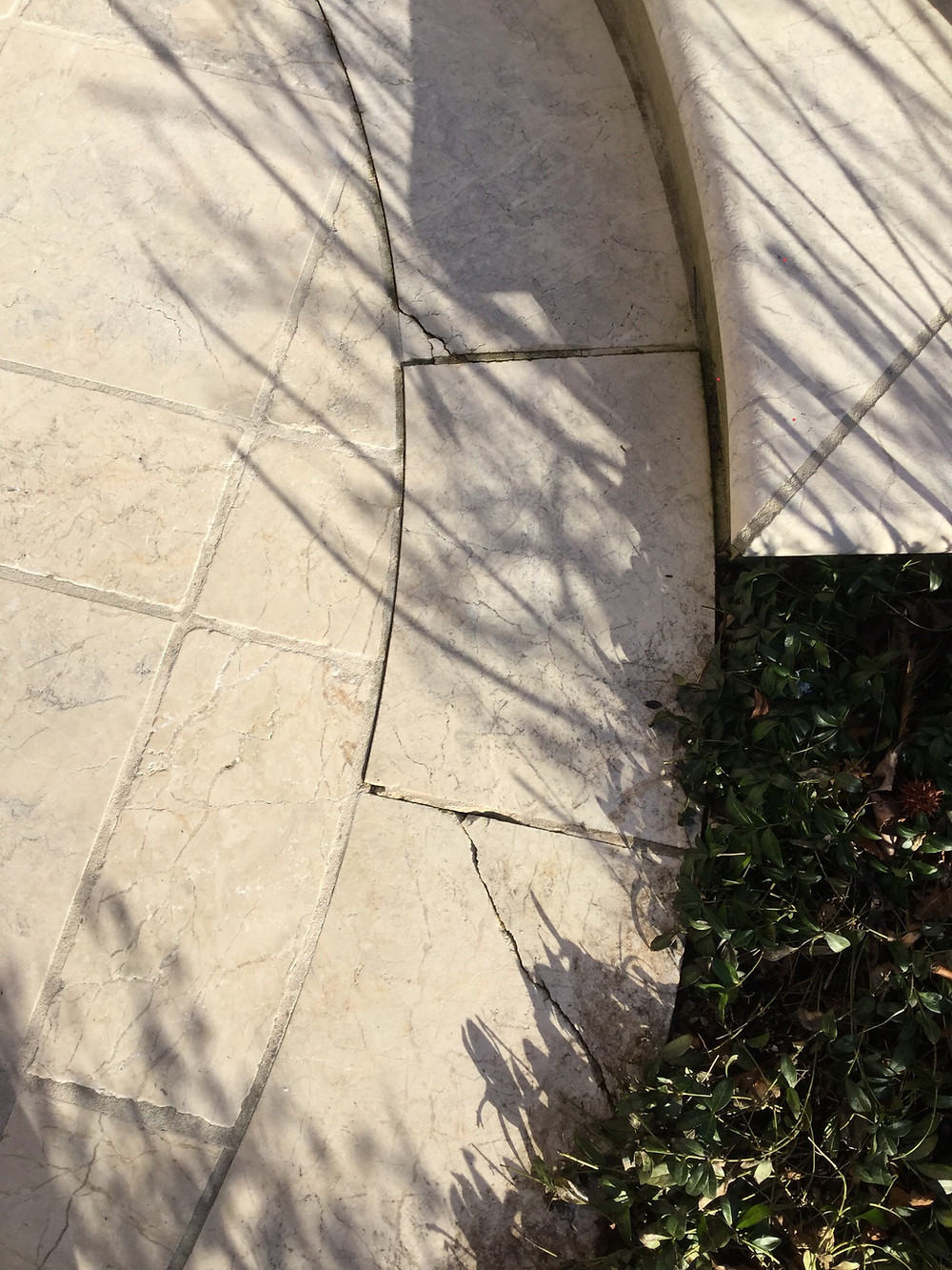 OUTDOOR MARBLE PATIO DAMAGE