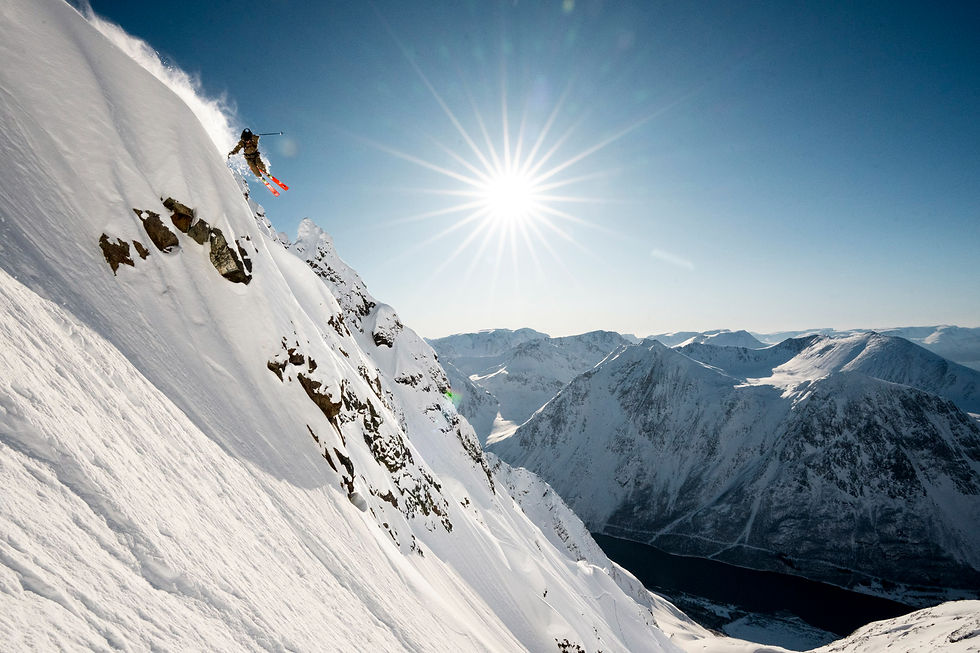 Nikolai Schirmer dropping off a cliff