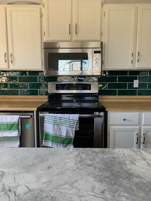 RenoVision Interiors Green Kitchen Tile Backsplash