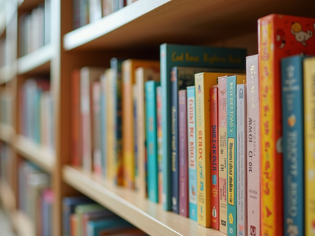 Wide angle view of a colorful children's bookshelf overflowing with books