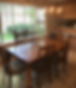 rustic dining area with table and chairs