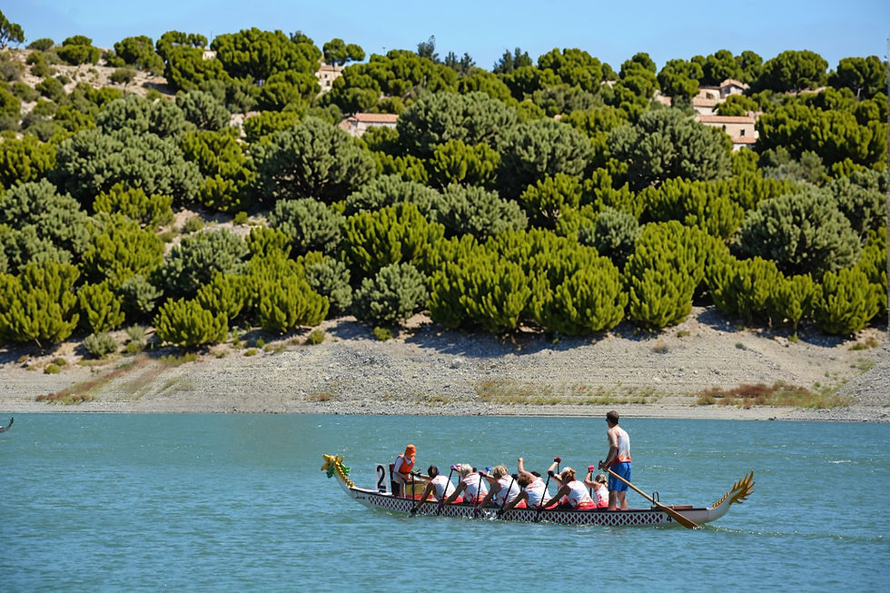 Eye-level view of a traditional wooden boat docked by the Cypriot shore