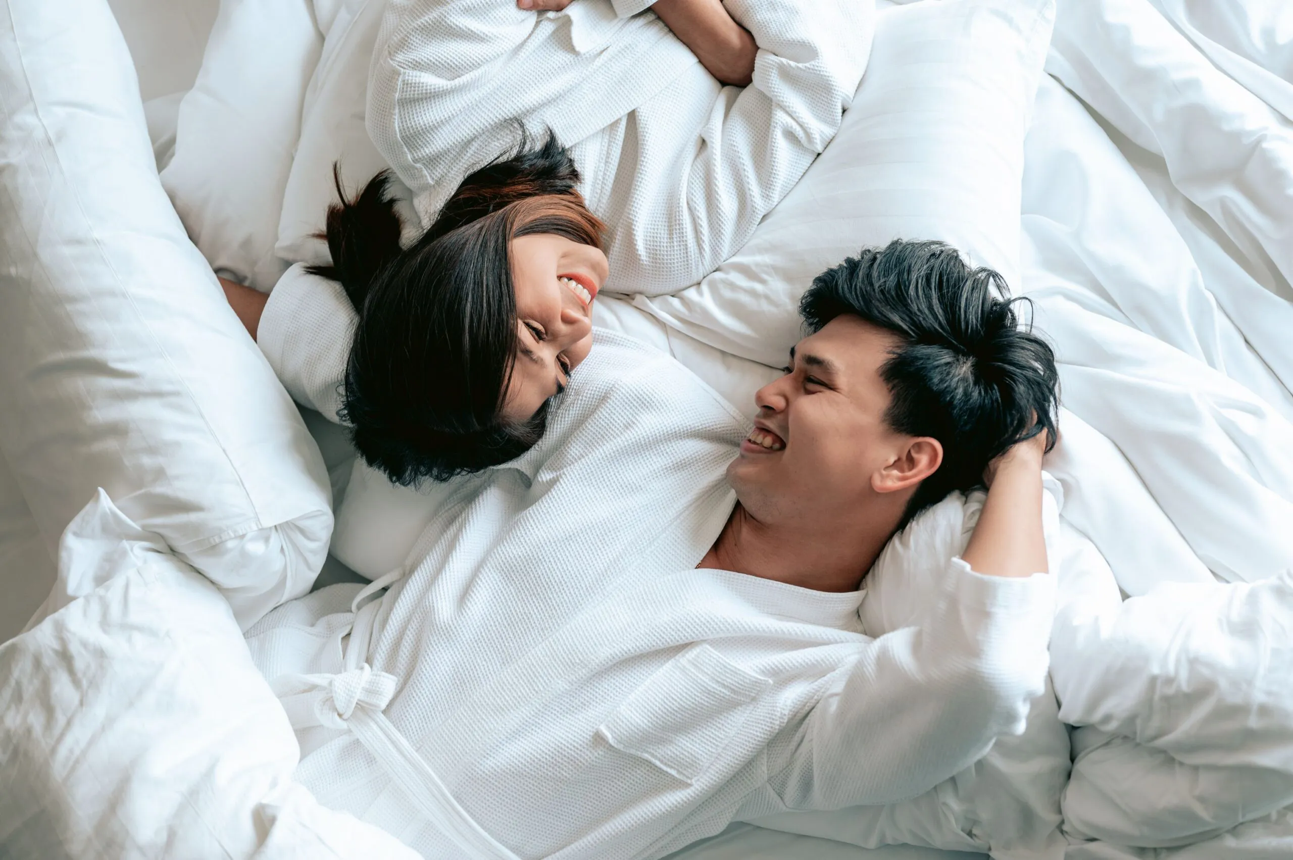 Wallbeds couple lying on bed