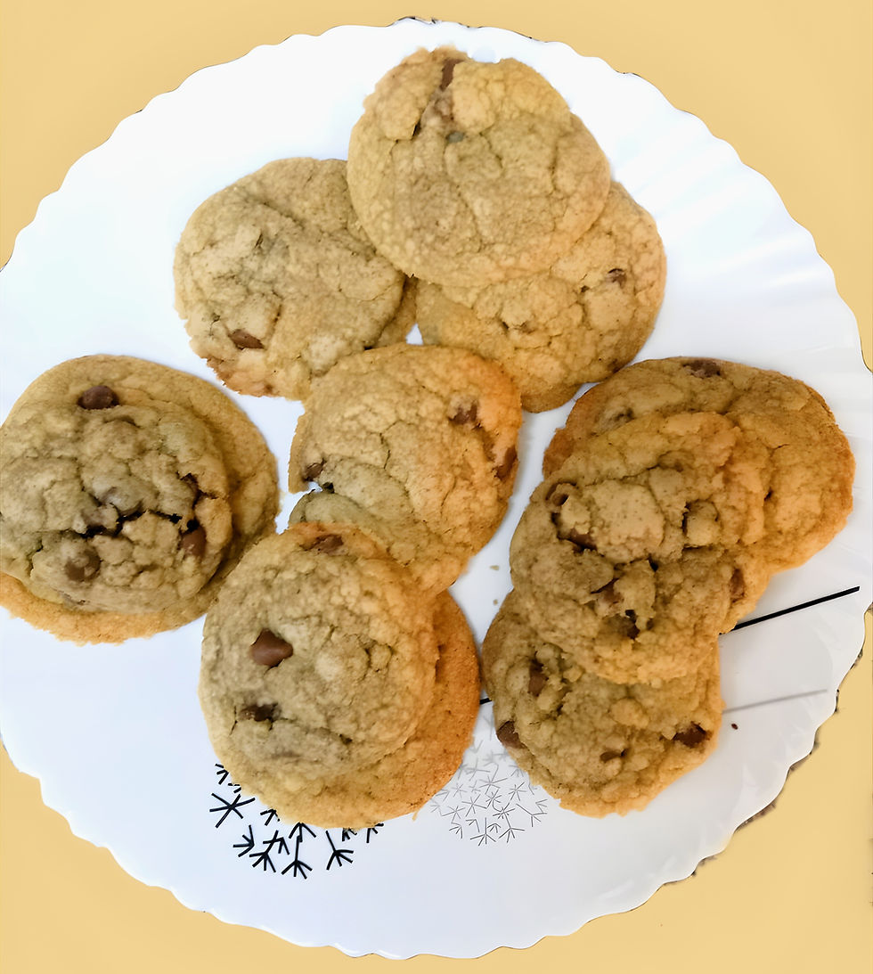 Close-up view of freshly baked chocolate chip cookies on a cooling rack