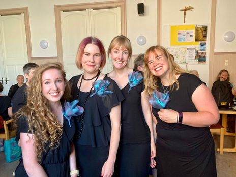 Four singers are ready to go on stage in Leiden