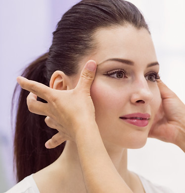 dermatologist-examining-female-patient-skin.jpg