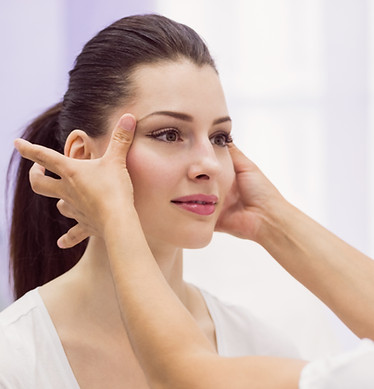 dermatologist-examining-female-patient-skin.jpg