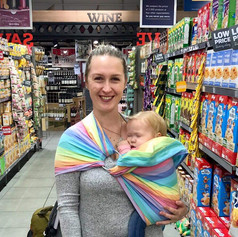 Lauren using a Ring Sling with her 3rd baby.