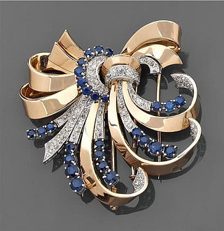 Double-clip Mauboussin 1940 or, diamants et saphirs Tajan