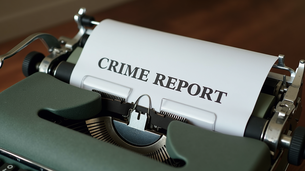 Close-up view of a vintage typewriter with a crime report document