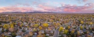 october-dawn-over-city-and-mountains