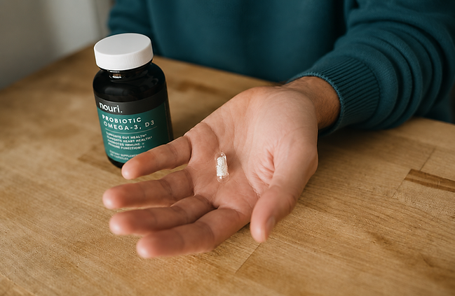 Man wearing green holding a handful of white pills