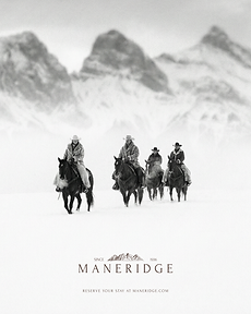 Riders on horseback moving through a snow-covered mountain landscape, capturing the spirit of winter equestrian retreat.