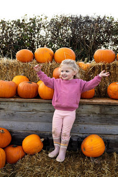 Drewton's Pumpkin Patch Child with Pumpkins