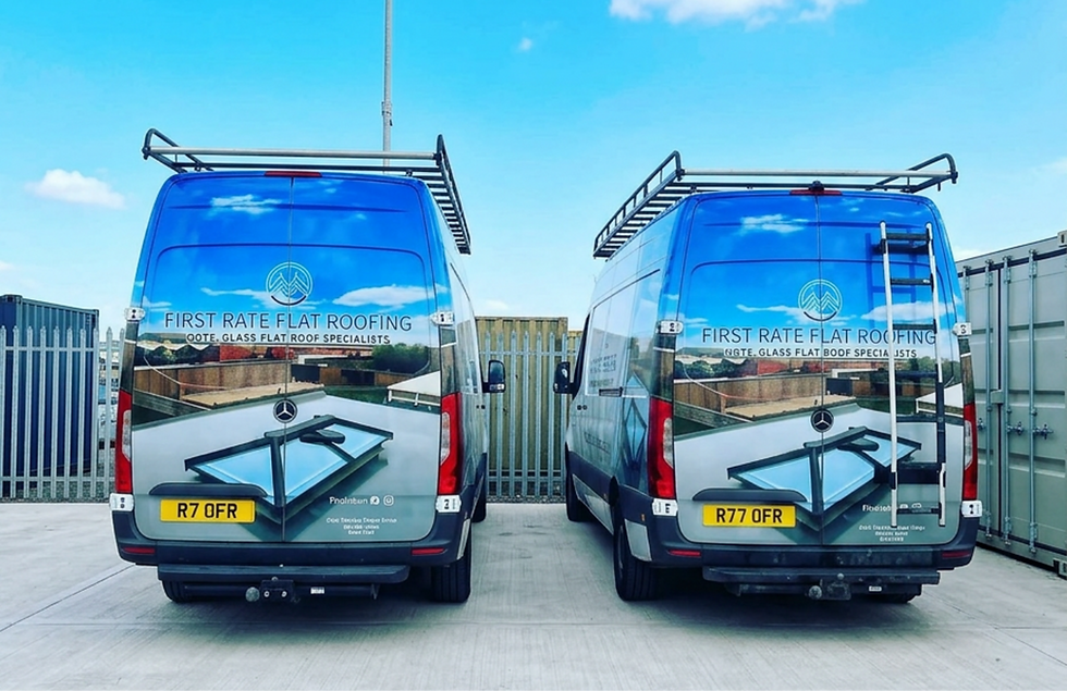 first-rate-flat-roofing-company-vans.png