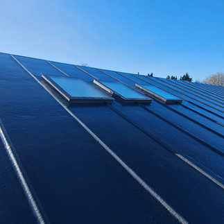 High-quality flat roofing system installed on a commercial property for long-lasting protection.
