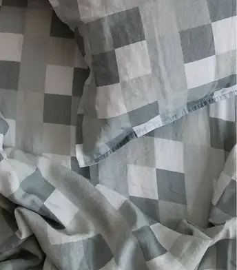 Shades of Green French flax linen sheet and pillowcases style on a bed