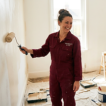 Firefly_Gemini Flash_Two professional decorators wearing clean white overalls, standing in