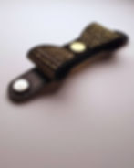 Black leather bow tie cat collar attachment with gold metal studs