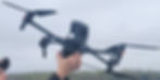 Man holding up drone.jpg