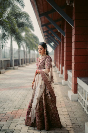 Traditional bride posing at a heritage-style venue, wedding photography Belgaum