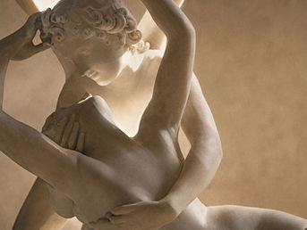A sculpture of two people embracing symbolizes the eight Sexual Scripts, Anima, Animus, intimacy, trust, and the dynamic balance of human sexuality.