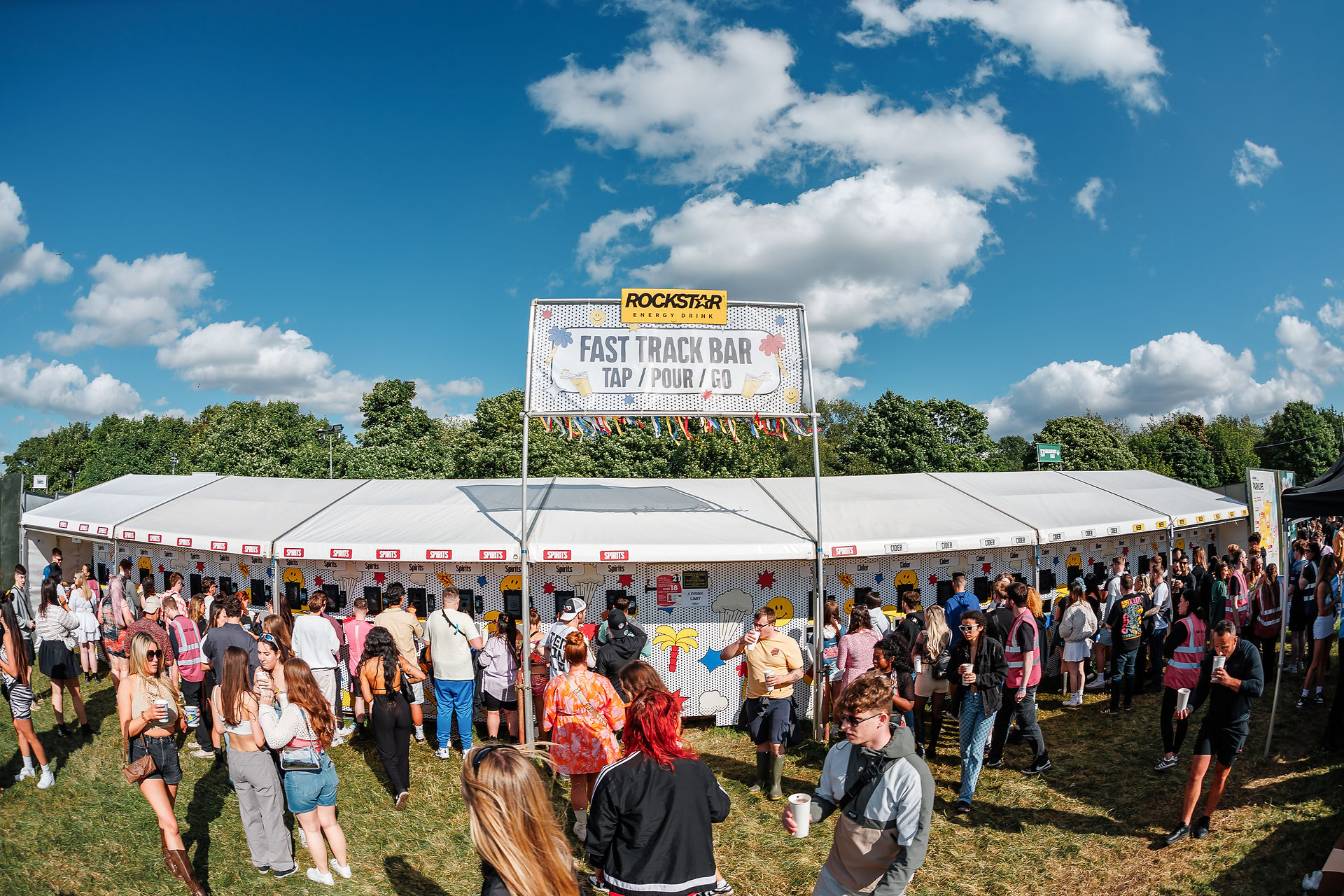 Front on view of a marque with customers at a festival