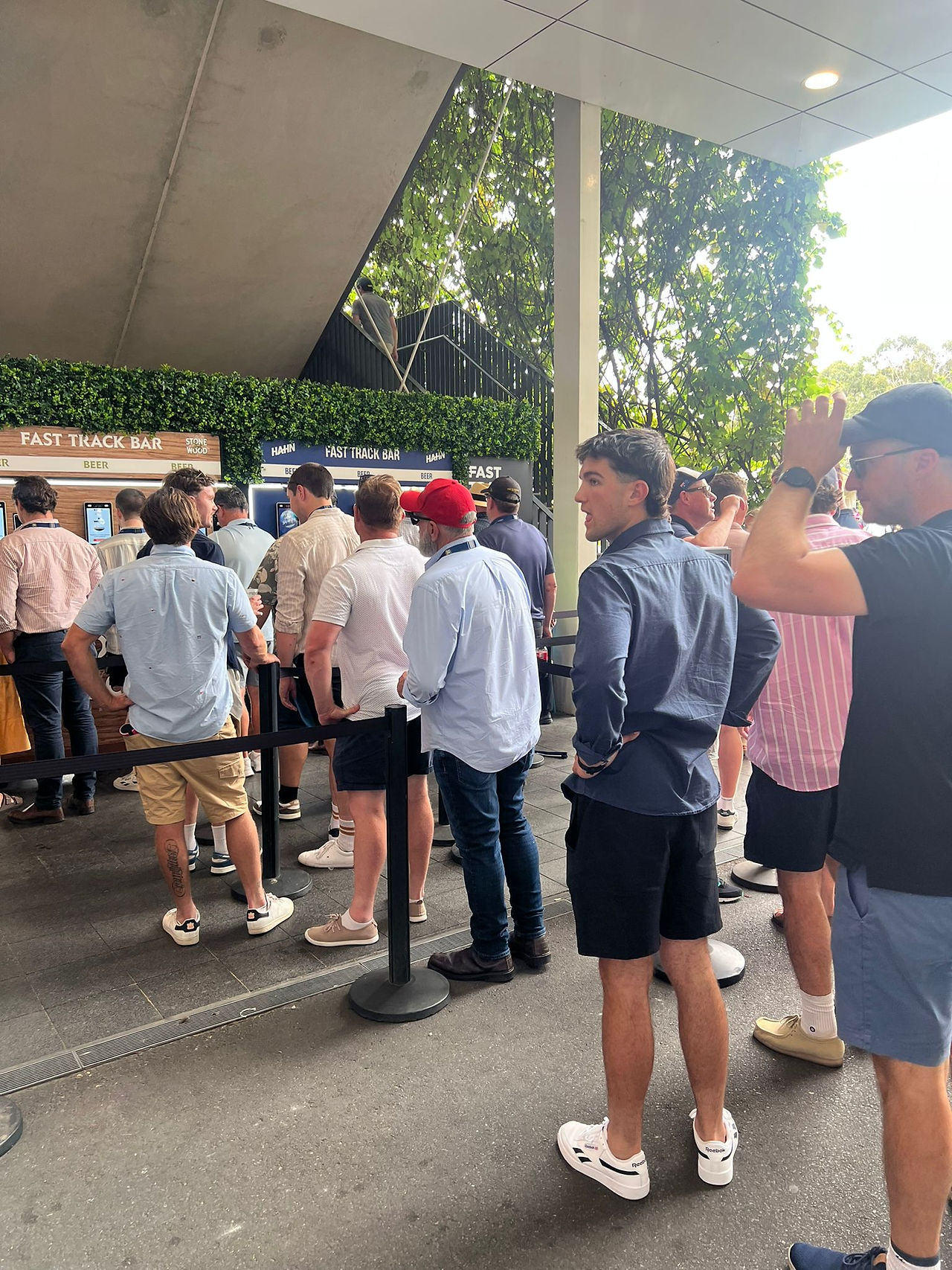 People queue for self service bar