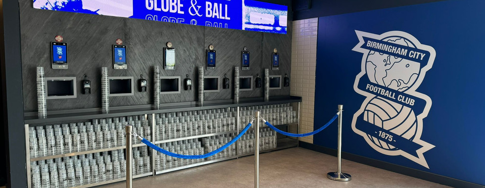 Self-service bar with tablet screens built into wall