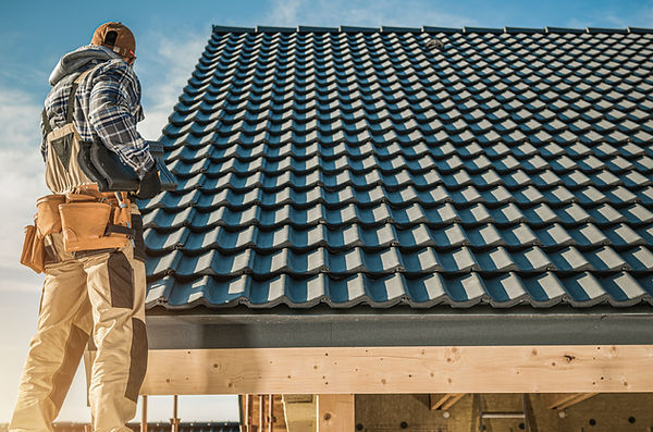 tile-roofing-worker-2026-03-25-00-02-40-utc (2).jpg
