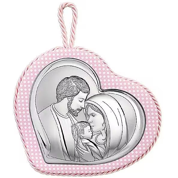 Capoculla Ottaviani a cuore rosa con pois bianchi, bordo intrecciato, cordoncino e Natività sulla parte centrale dall’aspetto argentato.