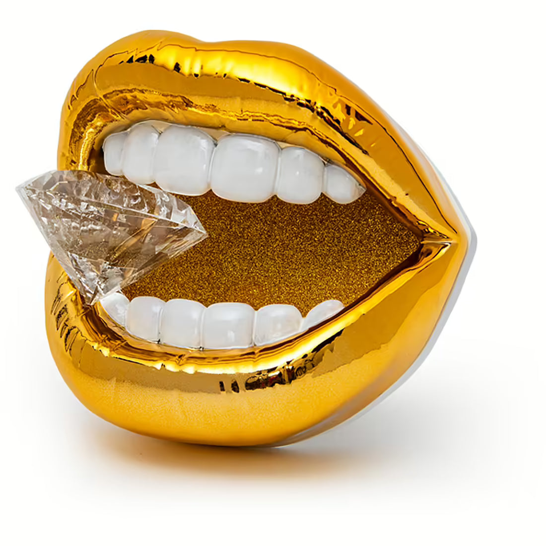 Scultura Sequenze a forma di bocca dorata aperta con denti bianchi ed elemento trasparente sfaccettato tra i denti