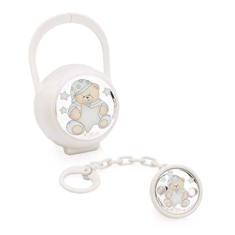 Set Ottaviani bianco con portaciuccio arrotondato e pinza circolare collegata a catenella e anello, entrambi decorati con orsetto e stelle.