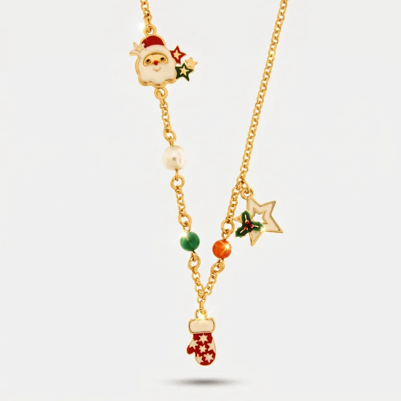 Collana BySimon dorata con guanto rosso, stella bianca, Babbo Natale ed elementi sferici colorati.
