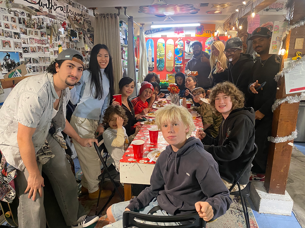 EduSkate student holiday potluck meal at SF Skate Club