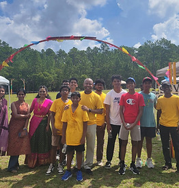 Overture Walker with community members at Indian Food Fest