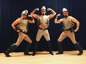 three princes flex in armor and tights for Princess Ida performances at NYU's Skirball Center with NYGASP