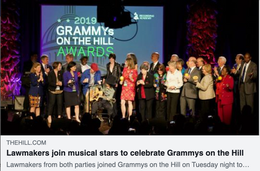 a group of people are gathered on a stage for the grammys on the hill awards