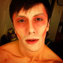 haunting portrait of a man in character makeup