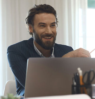 Smiling Businessman_edited_edited.jpg