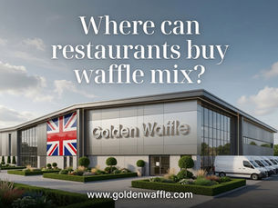 **Alt text:** A modern, upmarket UK food production factory with clean contemporary architecture, large glass windows, and landscaped gardens. Prominent realistic 3D “Golden Waffle” signage is mounted on the metallic facade next to a large Union Jack flag. Several white delivery vans are parked in a neat row. Large elegant white text at the top reads “Where can restaurants buy waffle mix?” and the website www.goldenwaffle.com appears at the bottom.