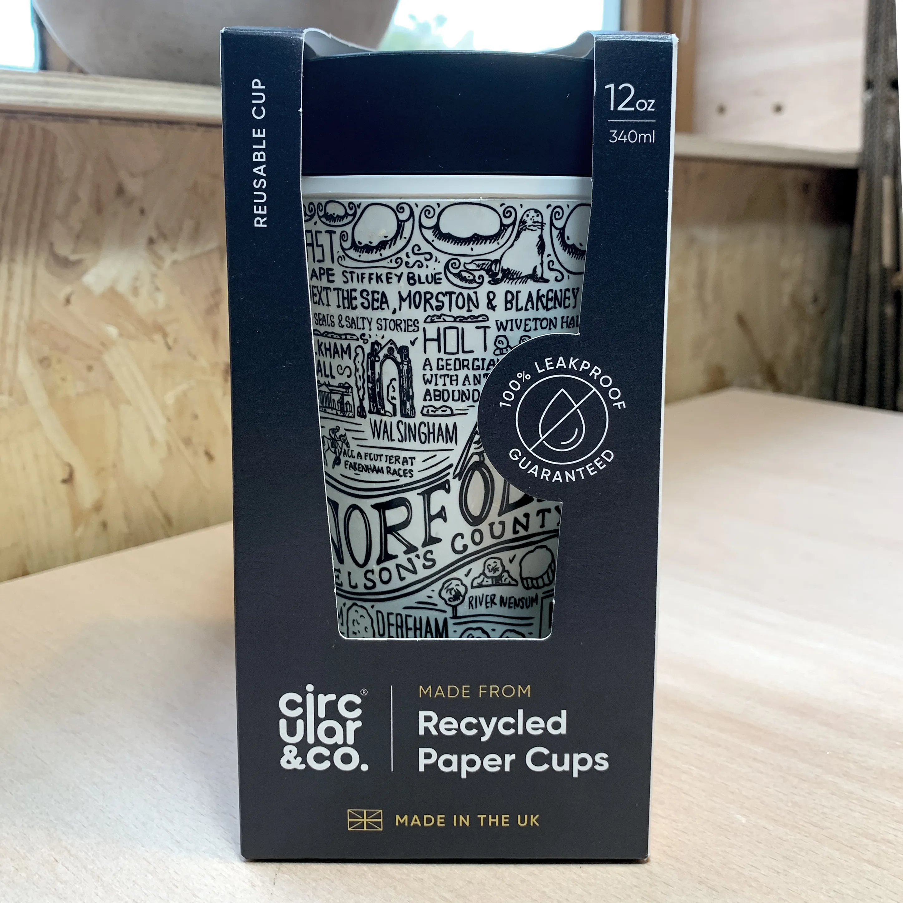 james illustrates on-the-go Norfolk mug on wooden dining table