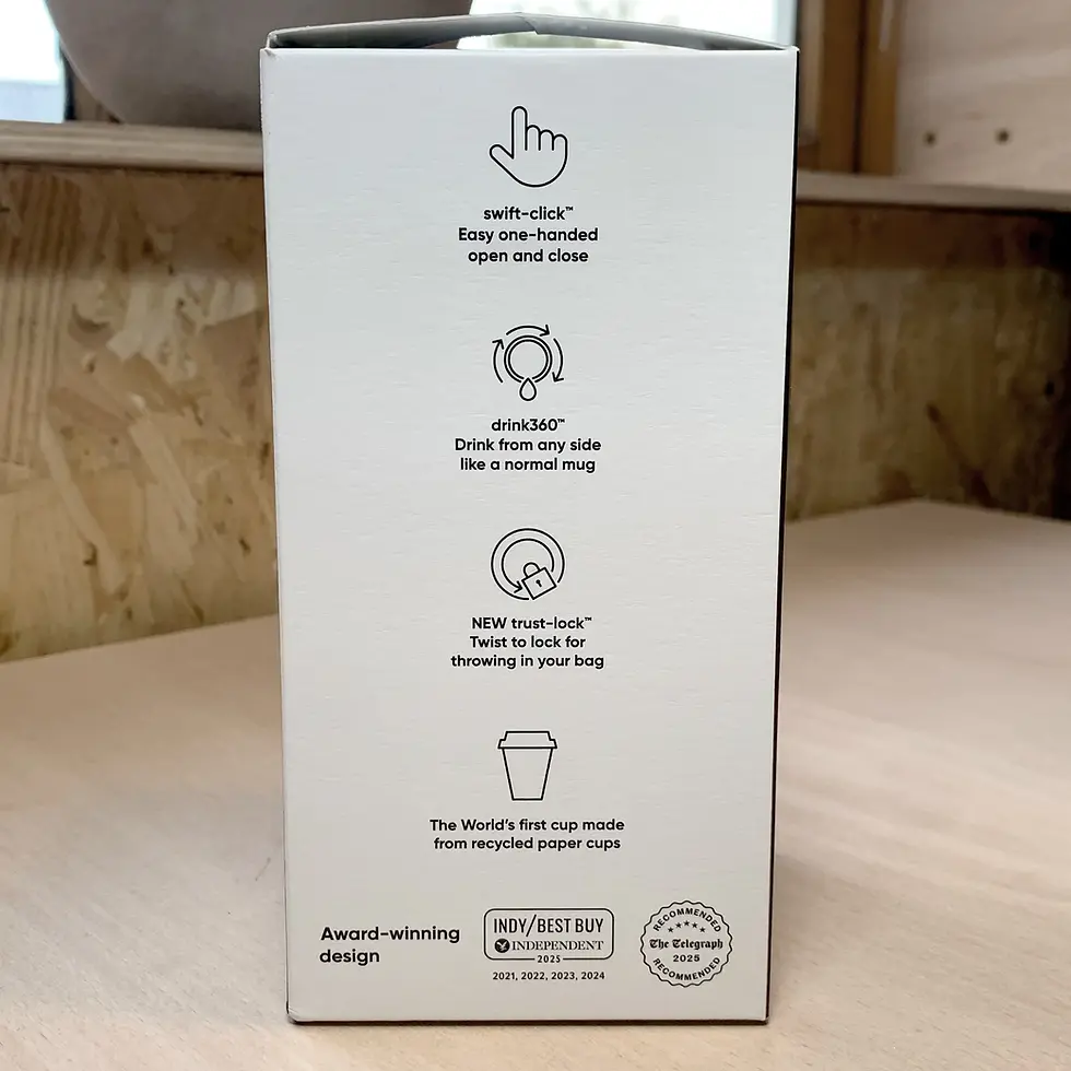 Thumbnail: The box of a James Illustrates Norfolk circular & co. reusable cup on a wooden table