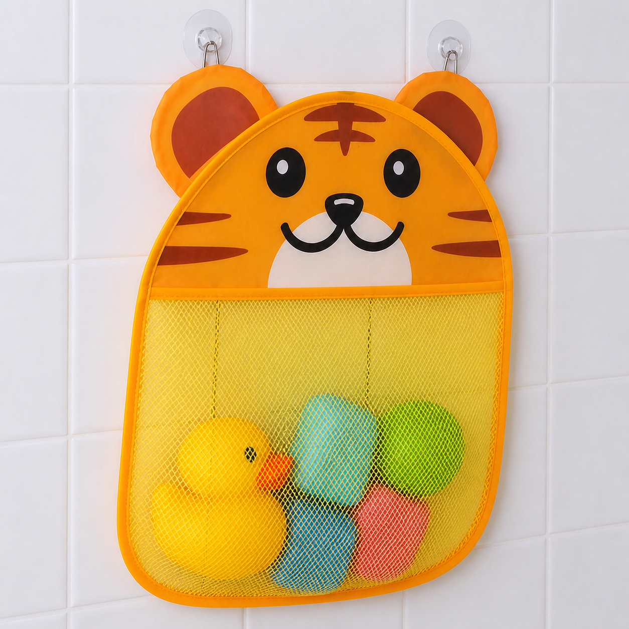Orange tiger bath-toy storage net draining on smooth bathroom tile