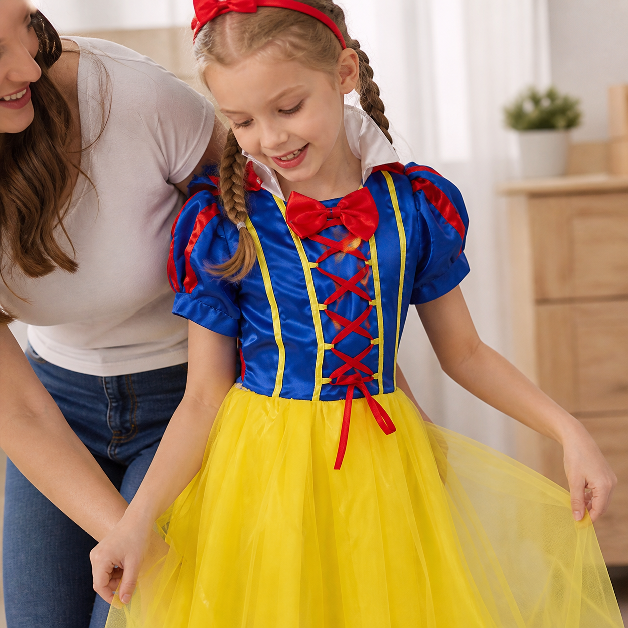 Snow White Princess Dress Up Kids Halloween Costume — close detail of the bodice, sleeves and yellow skirt texture while child stands naturally