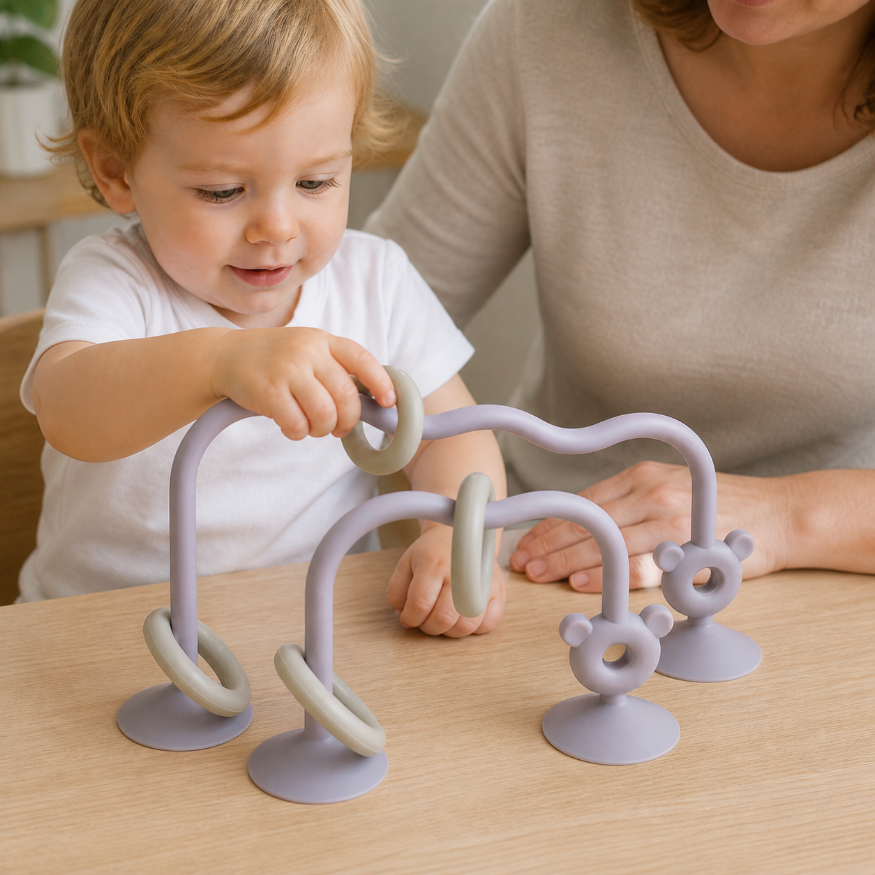 Silicone Children'S Desktop Toys Bead Wrap Baby Early — close overhead detail of natural fingers guiding one attached bead around a curve