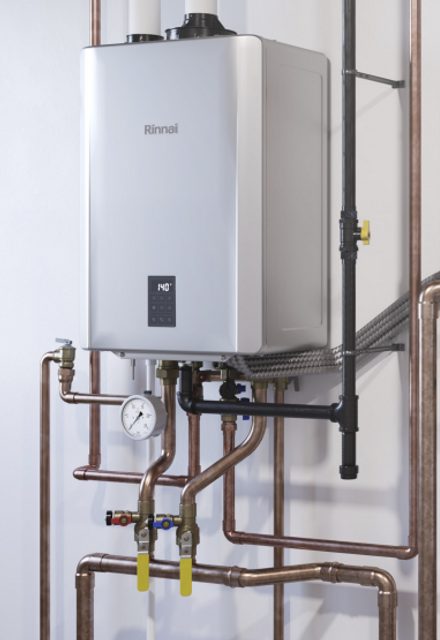 Rinnai Boiler On the wall with copper piping.png