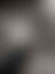 Black and white photograph of Mum swinging child around and smiling