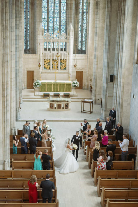 bride walking with groom during ceremony