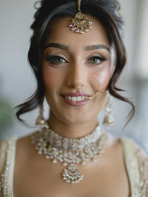 Portrait of a South Asian bride with traditional jewelry